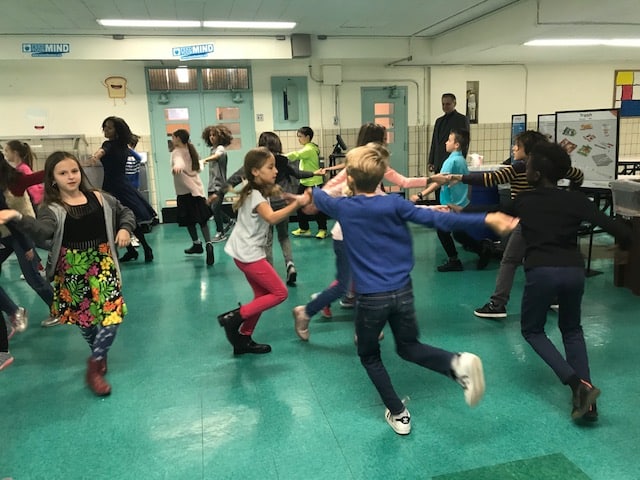 children dancing in class
