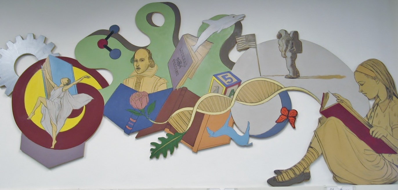 Mural of girl sitting and reading as images of a double helix, an astronaut, a dancer, William Shakespeare, a buttrfly, a dolphin a model of an atom and a rose flow out of her book